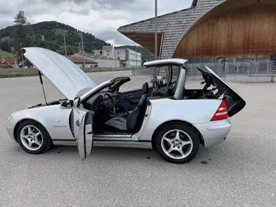 Mercedes-Benz SLK 230 Kompressor — Cabriolet sportif 1998, motorisation compressée 193 ch — side view