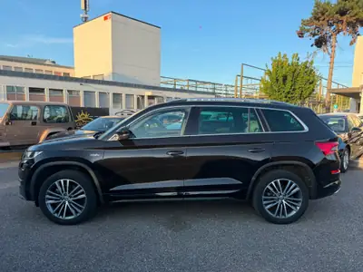 Skoda Kodiaq 2.0 TSI 4x4 L&K — SUV 7 places robuste, garantie 2 ans FULL OPTIONS — Heckansicht
