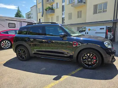 MINI Countryman 2.0i John Cooper Works ALL4 — Performance sportive et polyvalence 4x4 — rear view