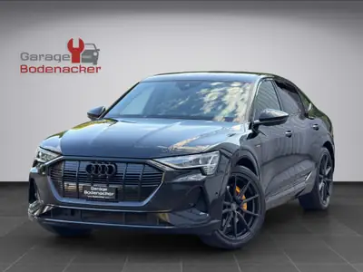 Audi e-tron 55 Sportback S Line — SUV électrique premium, 408 ch, design black intégral — vue extérieure