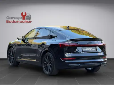 Audi e-tron 55 Sportback S Line — SUV électrique premium, 408 ch, design black intégral — tableau de bord