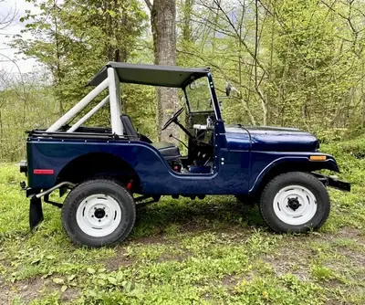 Jeep CJ-5 1970 — Légende du 4x4 cabriolet, véhicule vétéran impeccable — arrière