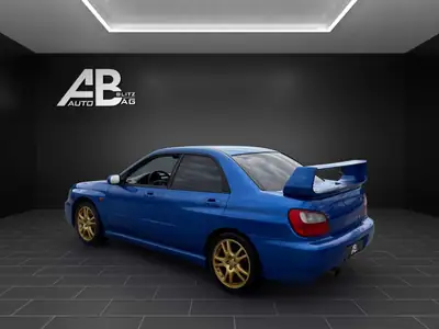 Subaru Impreza 2.0 Turbo WRX STI — Berline haute performance 4WD, 265 ch légendaires — arrière
