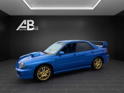 Subaru Impreza 2.0 Turbo WRX STI — Berline haute performance 4WD, 265 ch légendaires — côté