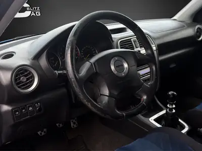 Subaru Impreza 2.0 Turbo WRX STI — Berline haute performance 4WD, 265 ch légendaires — Miniature 8