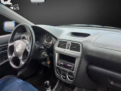 Subaru Impreza 2.0 Turbo WRX STI — Berline haute performance 4WD, 265 ch légendaires — Miniature 10