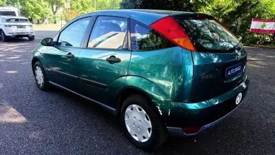 Ford Focus 1.4i 16V Ambiente — Citadine fiable des années 2000, entretien économique — détail