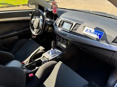 Mitsubishi Lancer 2.0 T MIVEC EVO Final Edition — Berline sportive affûtée, 295 ch et transmission manuelle — Miniatur 14
