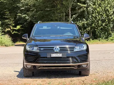 VW Touareg 3.0 V6 TDI 262 — SUV premium diesel, entretien complet & équipement R-Line — Seitenansicht