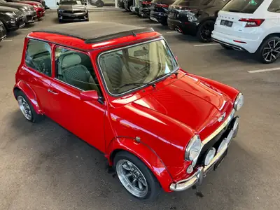 MINI 1.3i One — L'icône britannique rétro, essence économe et fiable — fianco