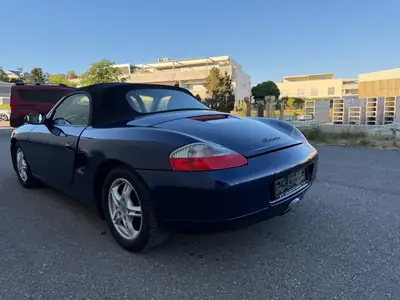 Porsche 718 Boxster 2.5 — Roadster sportif authentique, 220 ch et boîte manuelle — Heckansicht