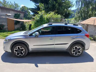 Subaru XV 2.0i Swiss Two 2014 — SUV compact 4x4 fiable, peu kilométré — side view