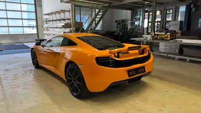 McLaren 12C — Supercar légendaire 600 ch, kilométrage exceptionnel — Seitenansicht