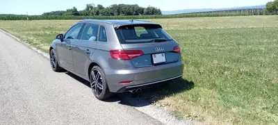 Audi A3 2.0 T FSI Design — Berline sportive 190 ch, toit panoramique et sièges chauffants — rear view