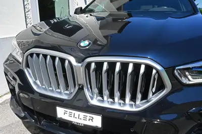 BMW X6 xDrive 48V 40i M Sport — Coupé SUV sportif, hybride rechargeable, équipements premium — Heckansicht