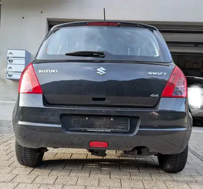 Suzuki Swift 1.3 GL 4WD — Citadine robuste tout-terrain, 104 500 km, sans sinistre — Seitenansicht