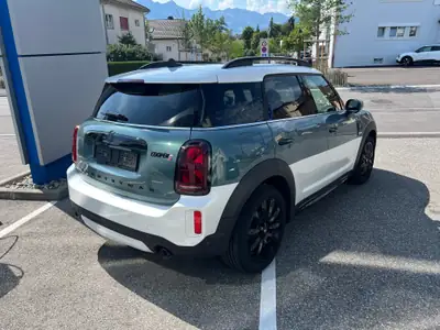 MINI Countryman Cooper S ALL4 Steptronic — SUV compact premium, 4RM et technologie dernière génération — fianco