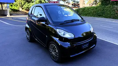 Smart Fortwo 2011 — Citadine maligne, moteur économique et pratique urbaine — Seitenansicht