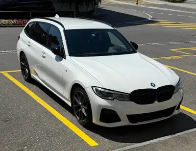 BMW M340d xDrive — Break sportif diesel, 340 ch et transmission intégrale — côté