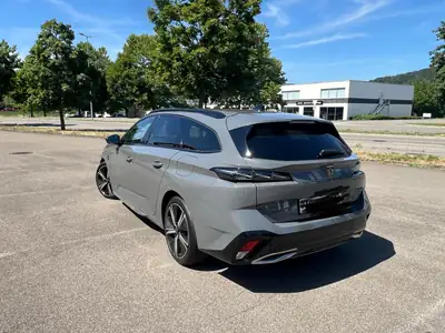 Peugeot 308 1.6 PHEV 180 GT — Break hybride rechargeable, émissions ultra-réduites — side view