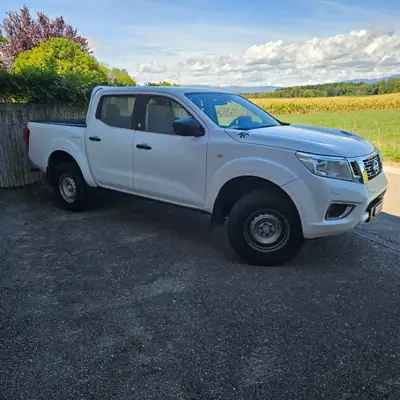 Nissan Navara Double Cab 2.3 dCi — Pickup robuste, 4x4 intégral, entretien réduit — Heckansicht