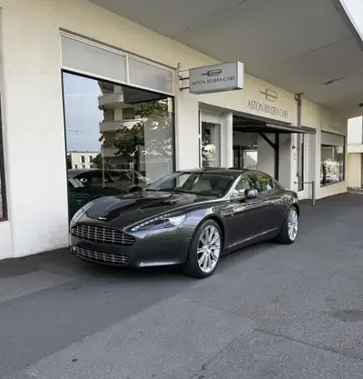 Aston Martin Rapide 5.9 V12 Touchtronic 2 — Berline sport luxe, 476 ch, historique sans accident — vue extérieure