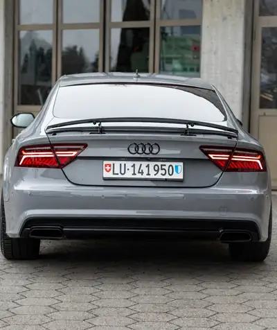 Audi A7 3.0 BiTDI Quattro — Berline coupé premium, 326 ch, consommation maitrisée — side view