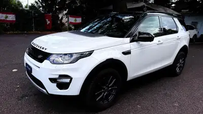 Land Rover Discovery Sport 2.2 SD4 — SUV 7 places robuste, transmission automatique 9 rapports — fianco