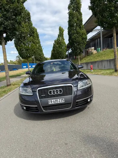 Audi A6 3.0 V6 TDI Quattro — Berline élégante, motorisation robuste et fiable — fianco