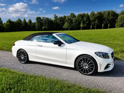 Mercedes-Benz C 200 Cabriolet AMG Line 4MATIC — Décapotable sportive, 84 000 km, service gratuit inclus — fianco