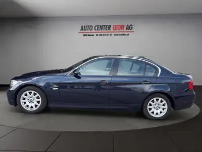 BMW 325xi 2006 — Berline polyvalente Xdrive, entretien complet et équipements premium — rear view