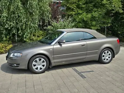 Audi A4 3.2 V6 Cabriolet — Élégance décapotable, motorisation prestigieuse — fianco
