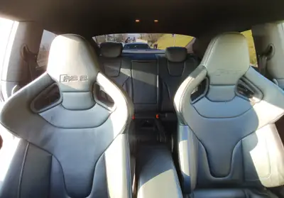 Audi RS5 Coupé 2011 — 450 ch Capristo, Carbon-Paket, sièges baquets — Seitenansicht