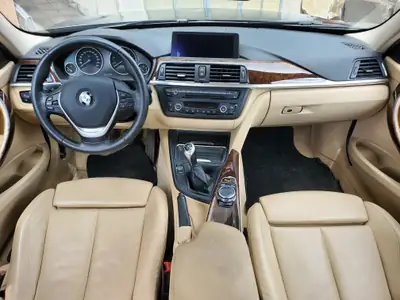 BMW 320i xDrive Touring 2013 — Breaks polyvalent, traction intégrale et fiabilité germanique — cruscotto