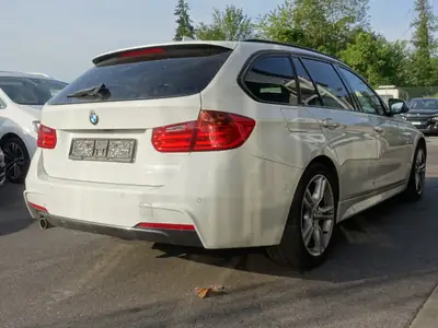BMW 320d xDrive Touring Sport Line — Monospace diesel robuste, transmission automatique Steptronic — rear view