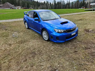 Subaru WRX 2.5 T Sport 2011 — Berline sportive 300 ch, transmission manuelle, 4 roues motrices — Seitenansicht