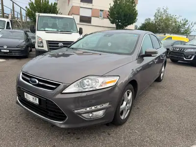 Ford Mondeo Break TDCi 140 ch — Familial diesel automatique, entretien maîtrisé — side view