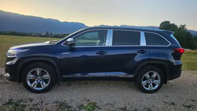 Toyota Highlander 2015 — SUV 7 places hybride, 212'000 km, sans sinistre — fianco
