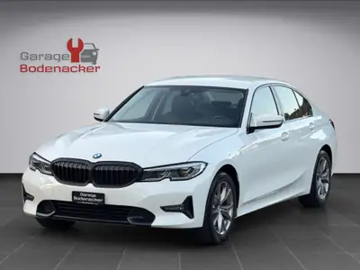 BMW 320d xDrive 48V — Berline diesel sportive avec technologie hybride légère — side view