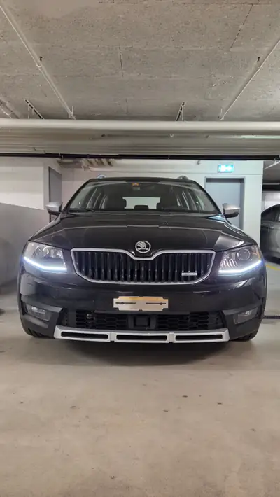 Skoda Octavia 2.0 TDI 150 4x4 — Break robuste, intégrale et sans sinistre — side view
