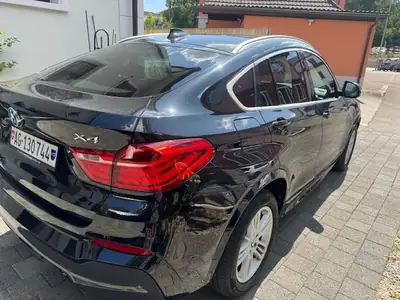BMW X4 20d xDrive — SUV coupé diesel performant, sans sinistre — side view