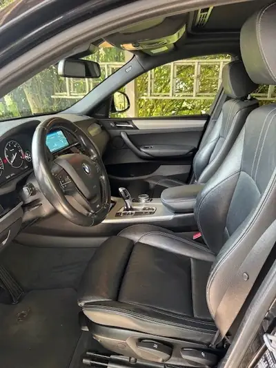 BMW X4 20d xDrive — SUV coupé diesel performant, sans sinistre — rear view