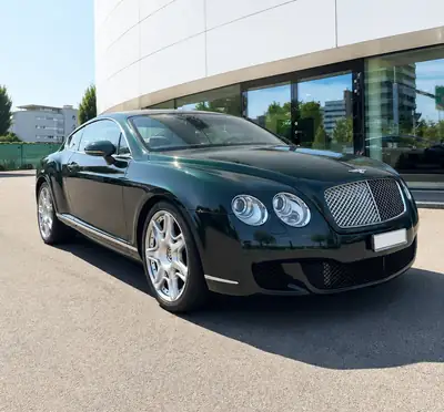 Bentley Continental GT 6.0 V12 — Coupé sportif de luxe, 560 ch, historique complet — côté