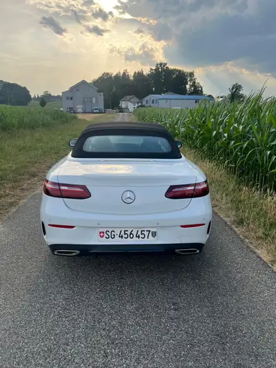 Mercedes-Benz E 450 AMG Line 4MATIC Cabriolet — Élégance décapotable, motorisation hybride et toutes options — côté