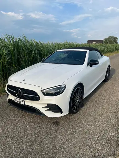 Mercedes-Benz E 450 AMG Line 4MATIC Cabriolet — Élégance décapotable, motorisation hybride et toutes options — vue extérieure
