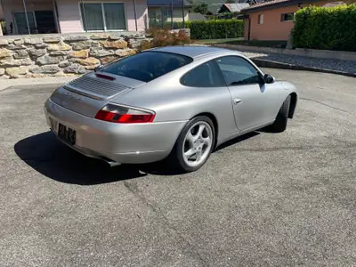 Porsche 911 Carrera 4 3.4 — Coupé sportif légendaire, 300 ch, boîte manuelle — Seitenansicht