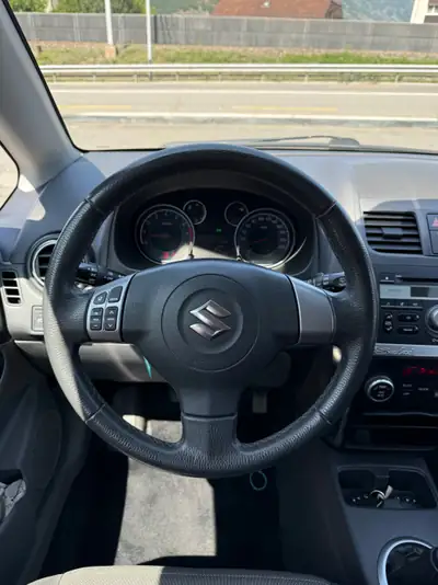 Suzuki SX4 1.6 GL Top — 4WD robuste, entretien à jour, 89 500 km — Miniature 11