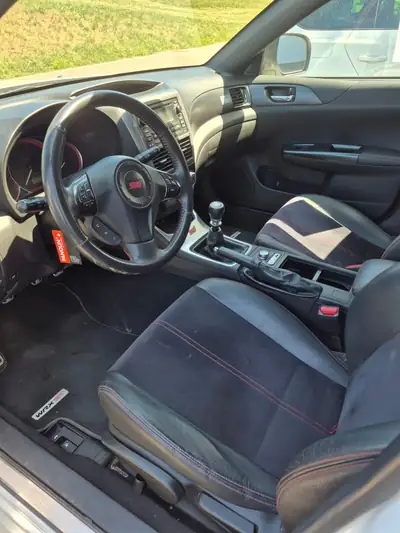 Subaru WRX STI 2011 — Berline sportive 301 ch, transmission intégrale, sans accident — rear view