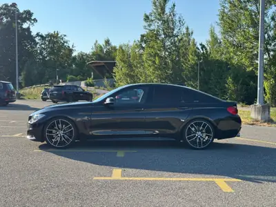 BMW 435i xDrive — Coupé sportif 306 ch, transmission intégrale, parfait état — côté