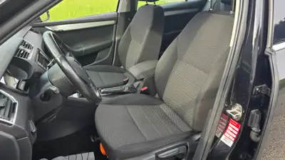 Skoda Octavia 1.8 TSI Elegance 4x4 — Break dynamique, transmission DSG, état impeccable — Thumbnail 11